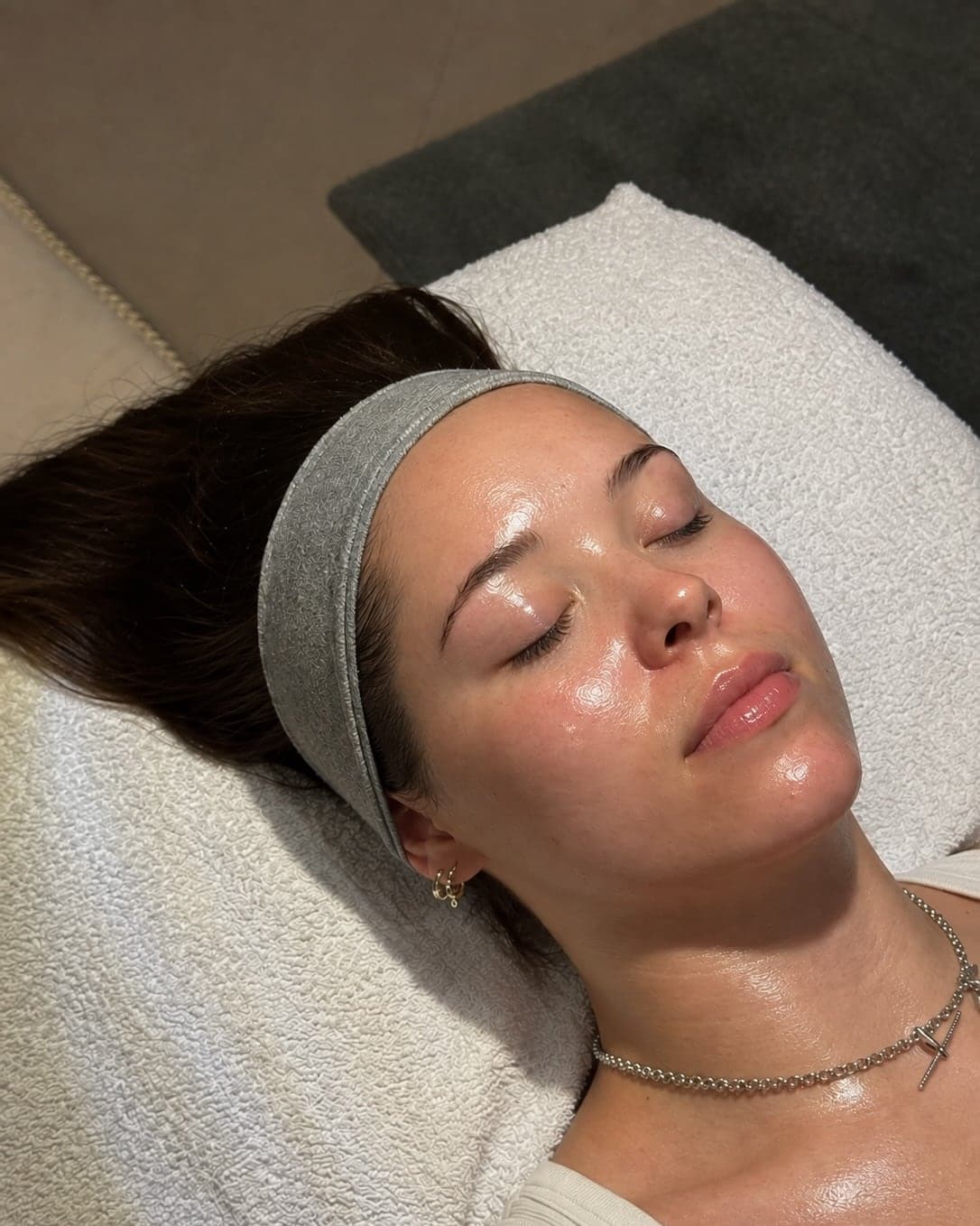 A client with glowing skin after a Medik8 facial at Cove Clinic in Penrith