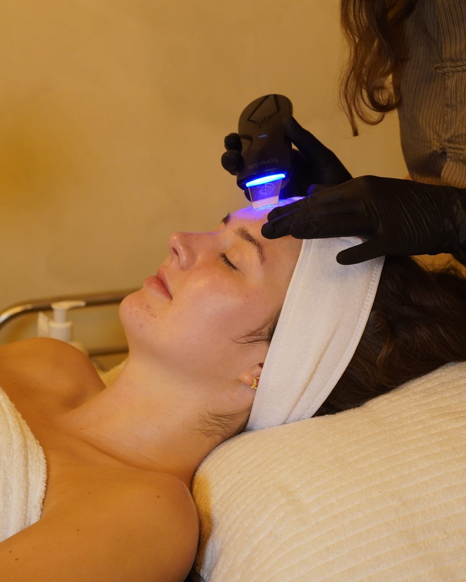 Gina carrying out a skin treatment at Cove Clinic in Penrith